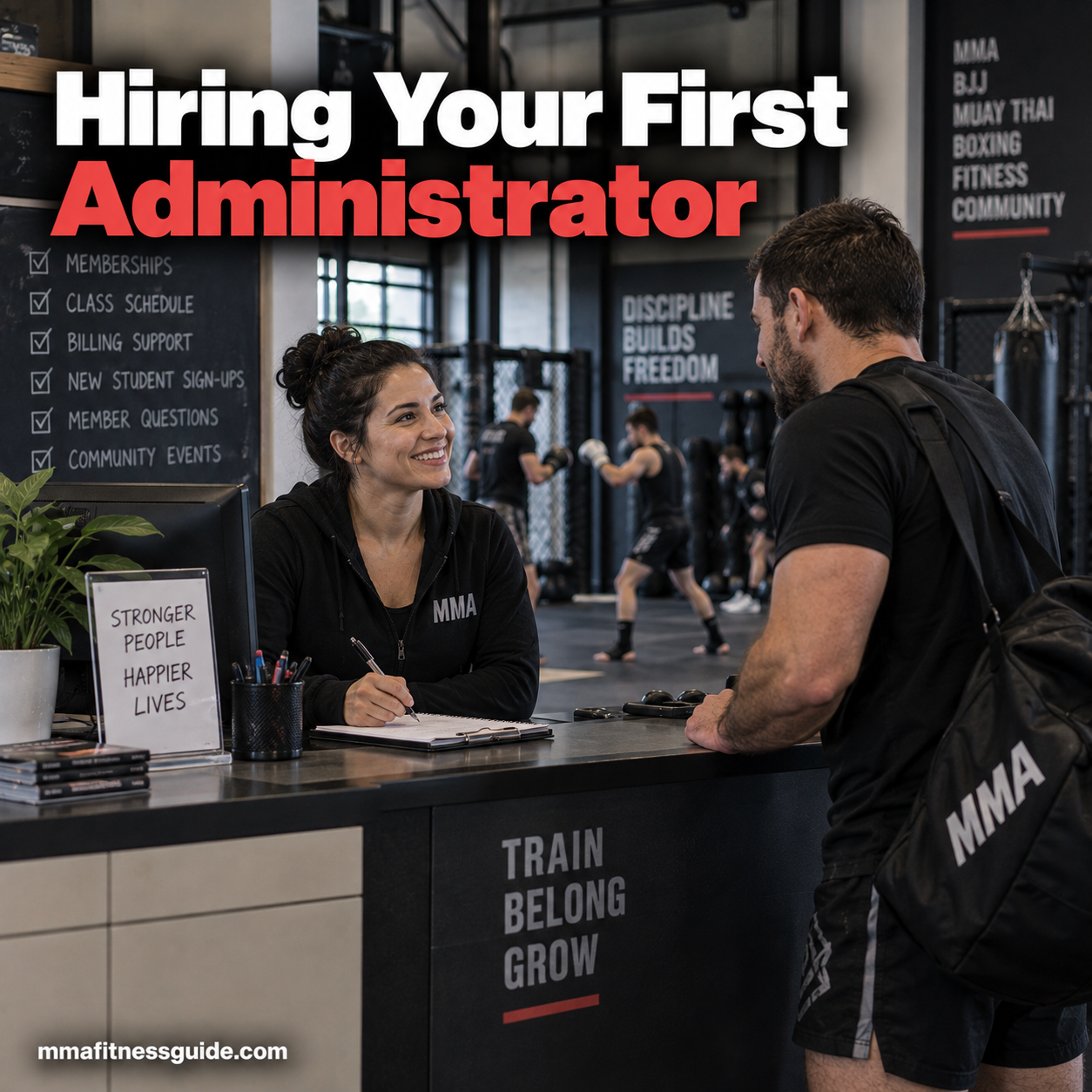 MMA gym administrator helping a member at the front desk while athletes train in the background.